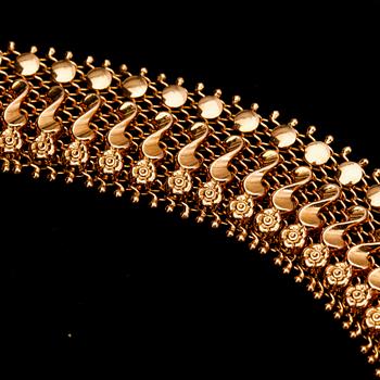 HALSCOLLIER, guld 18K, svensk importstämpel, 1900-tal. Vikt ca 62 gram.