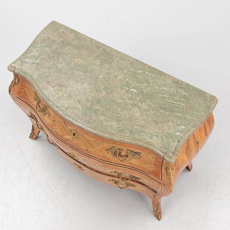 A Swedish rosewood parquetry and gilt brass-mounted rococo commode, Stockholm, later part 18th century.