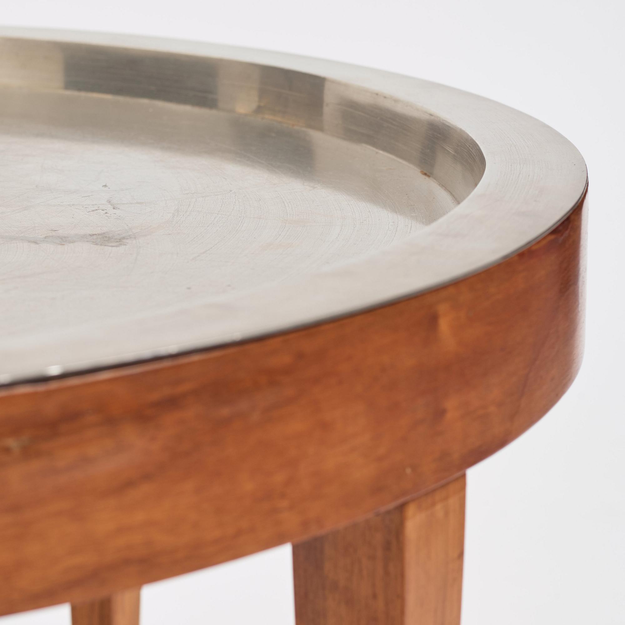 Josef Frank, a pewter top walnut table, model 2110, Svenskt Tenn Sweden, Mid 20th C. The table was designed in 1947.