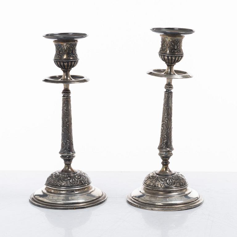 A pair of Swedish silver Renaissance-revival candlesticks, mark of CG Hallberg, Stockholm 1883.