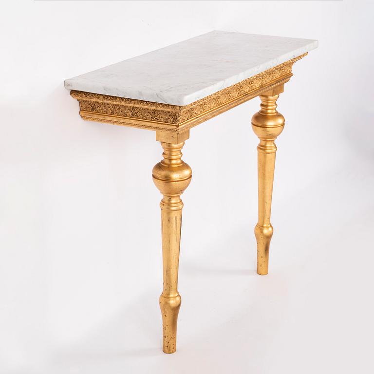 A mirror and a console table, around the year 1900.