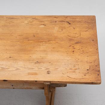 A Swedish pine trestle table, 18th / 19th century.
