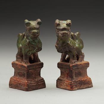 A pair of green and yellow glazed joss stick holders, Ming dynasty (1368-1644).