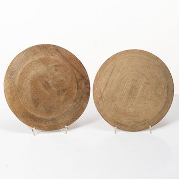 Twelve wooden plates, 19th Century.