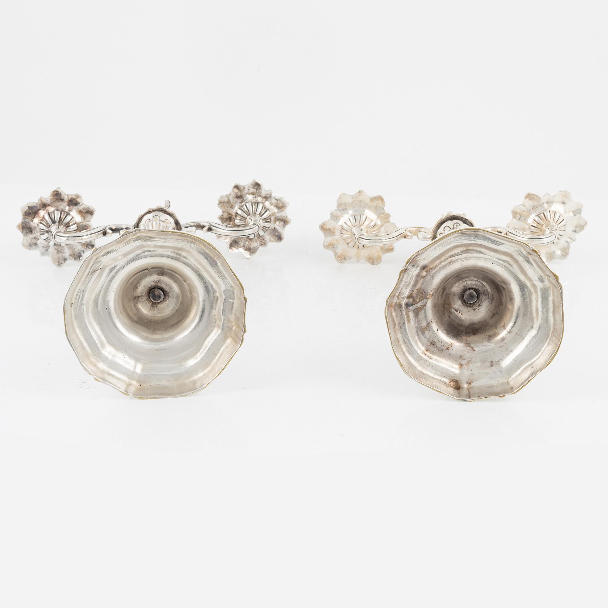 A pair of silverplated candelabras, Louis XV, 18th Century.