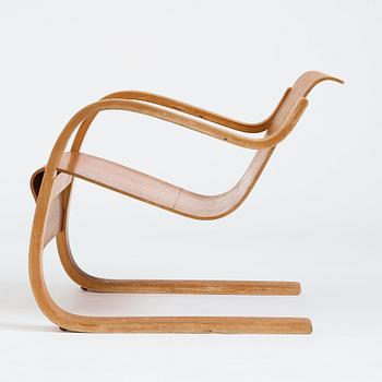 Alvar Aalto, a model 31 burled birch armchair, produced by O.y Huonekalu-ja Rakennustyötehdas, Finland or Aalto Design Hedemora.