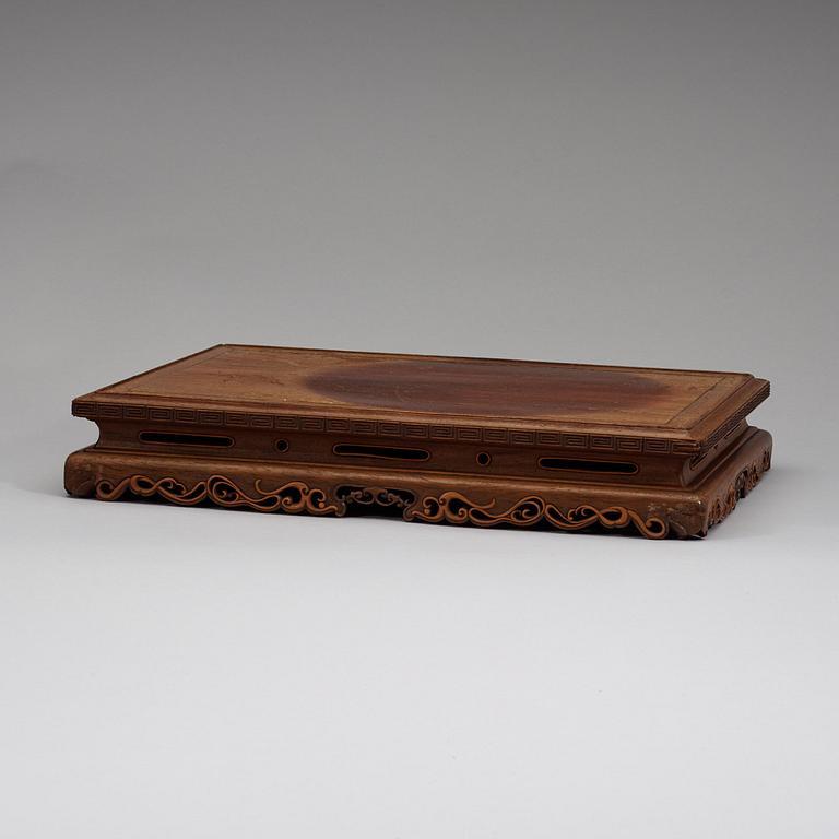 A hardwood stand, Qing dynasty, late 19th century.