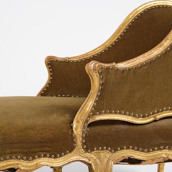 A French Louis Xv giltwood lit de repos, later part 18th century.
