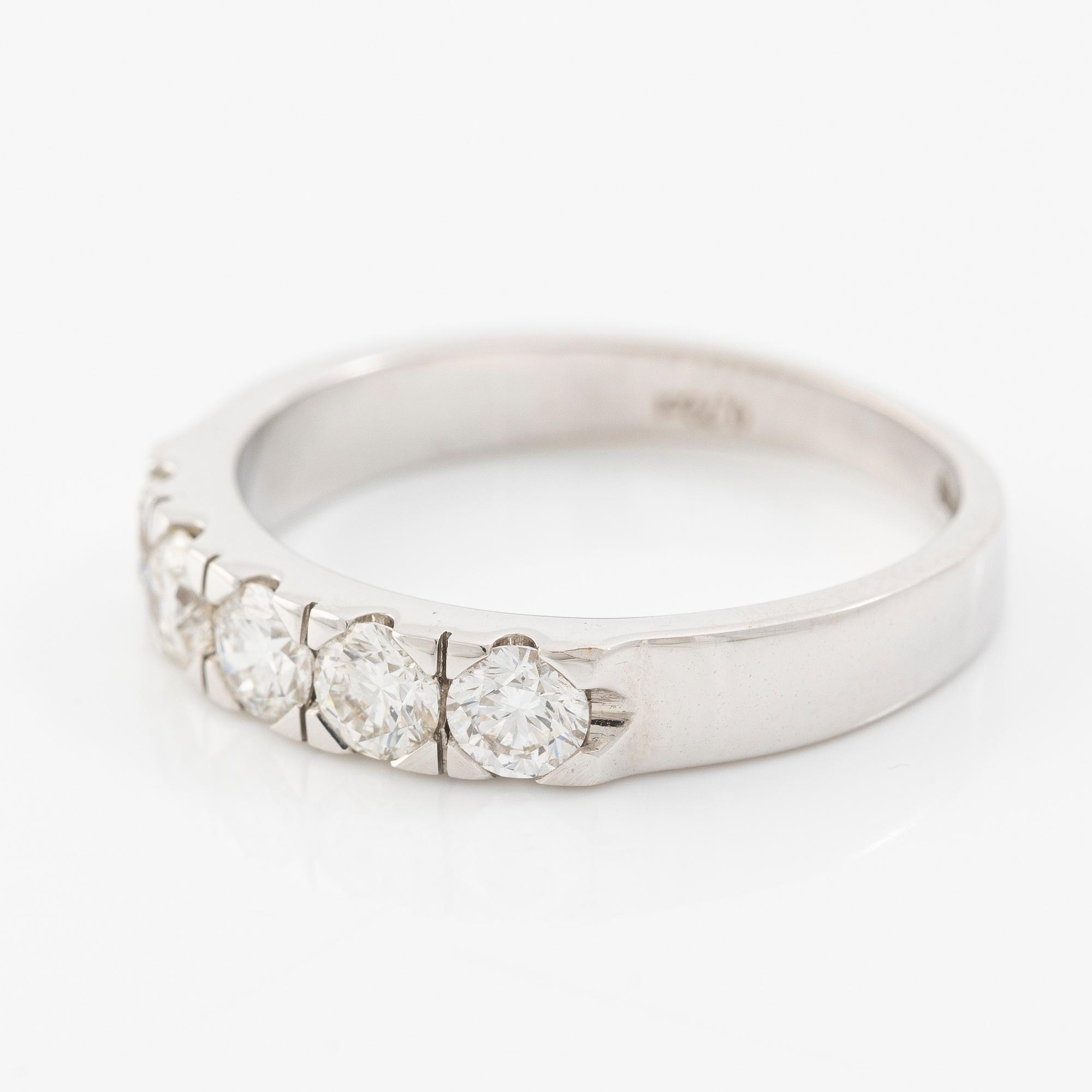 Ring 18K white gold half eternity band set with brilliant-cut diamonds.