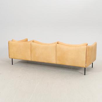 Andreas Engesvik, a Tiki leather sofa and stool for Fogia 21st century.