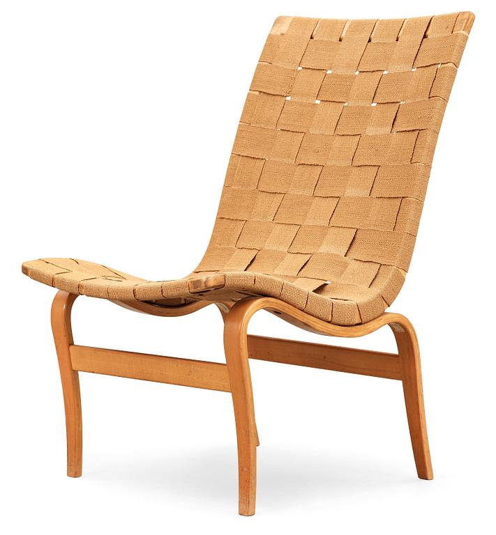 A Bruno Mathsson beech and canvas easy chair, 'Eva', Karl Mathsson, Värnamo, Sweden 1940's.