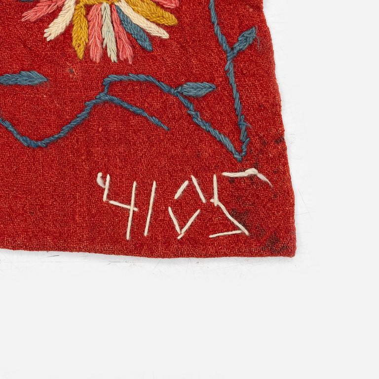 An embroided wool bed cover of 'fall of man' design, South west Scania, Sweden, first half of the 19th century.