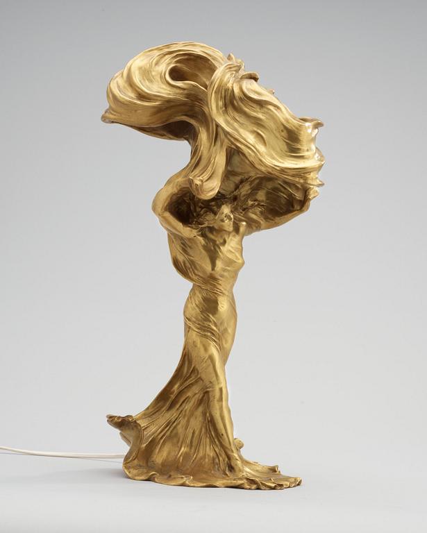 A Francois-Raoul Larche 'Loïe Fuller' Art Nouveau gilt-bronze figural table lamp, Siot-Decauville, Paris circa 1900.