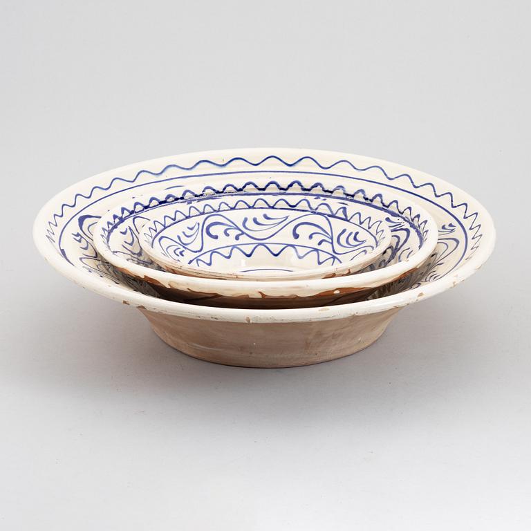 Three faience bowls, early 20th century.