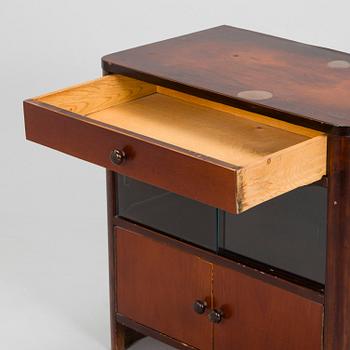 A 1930s functionalist style chest of drawers.