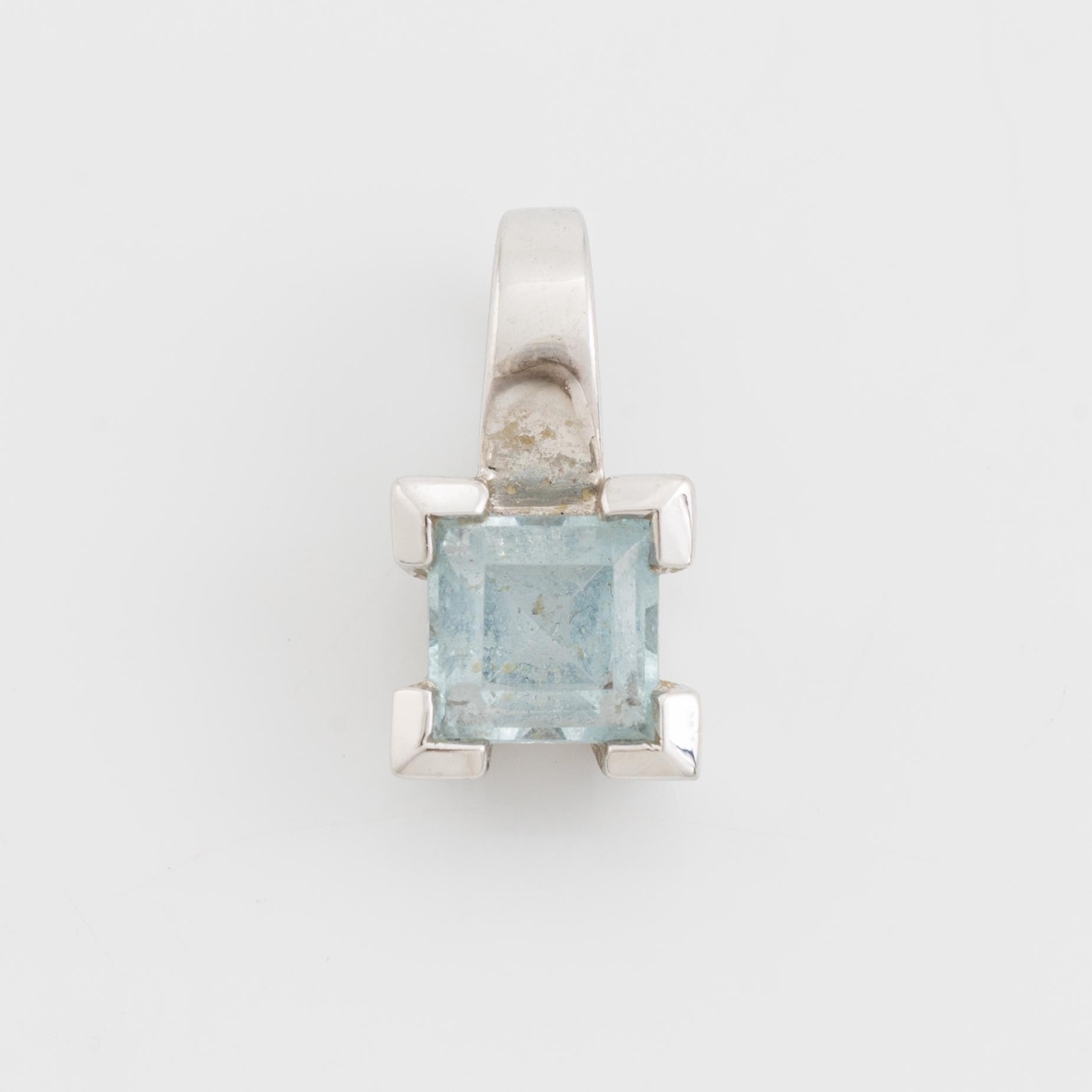 Ring, pendant, and a pair of earrings, 18K white gold with topaz and small diamonds.