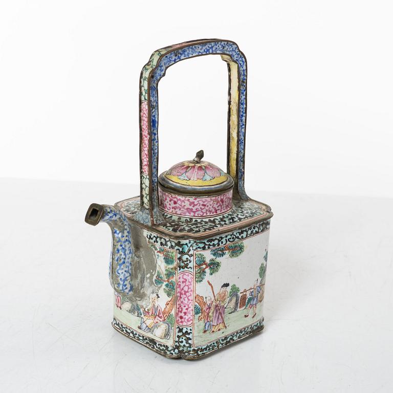 A Chinese enamel on copper teapot and an enamel box with carved wooden cover, Qing dynasty, 18th century.