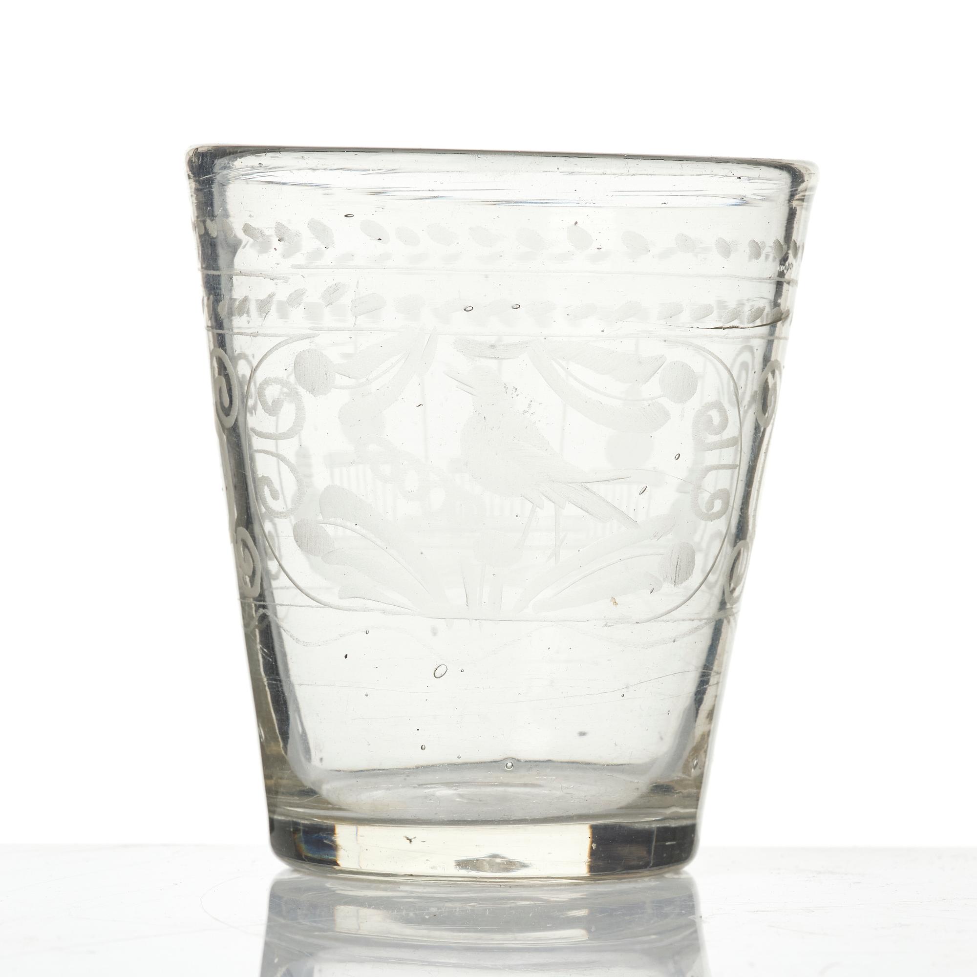 An engraved glass goblet, 18th century.