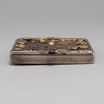 A Russian 20th century parcel-gilt cigarette-case, unidentified makers mark, St. Petersburg 1908-1917.