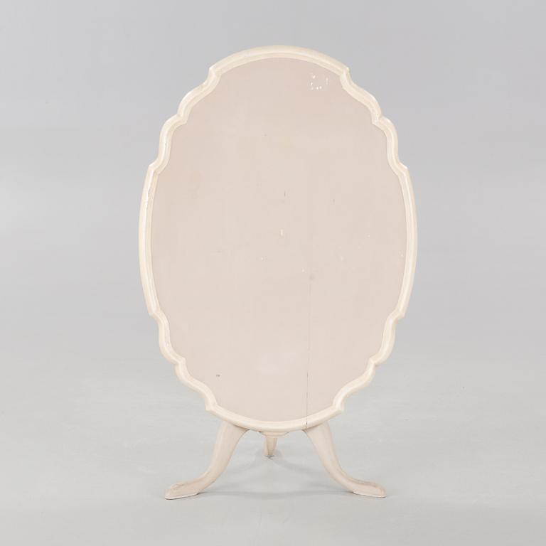 A late 19th century drop-leaf table.