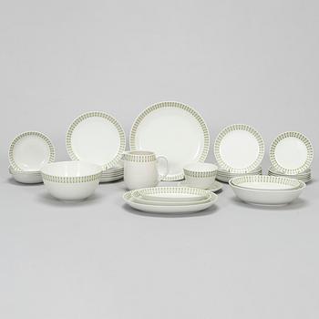 Raija Uosikkinen, A 32-piece set of 'Lily of the valley' faience dinnerware for Arabia 1960s.