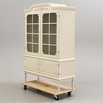 A gustavian style cabinet, last quarter of the 20th century.