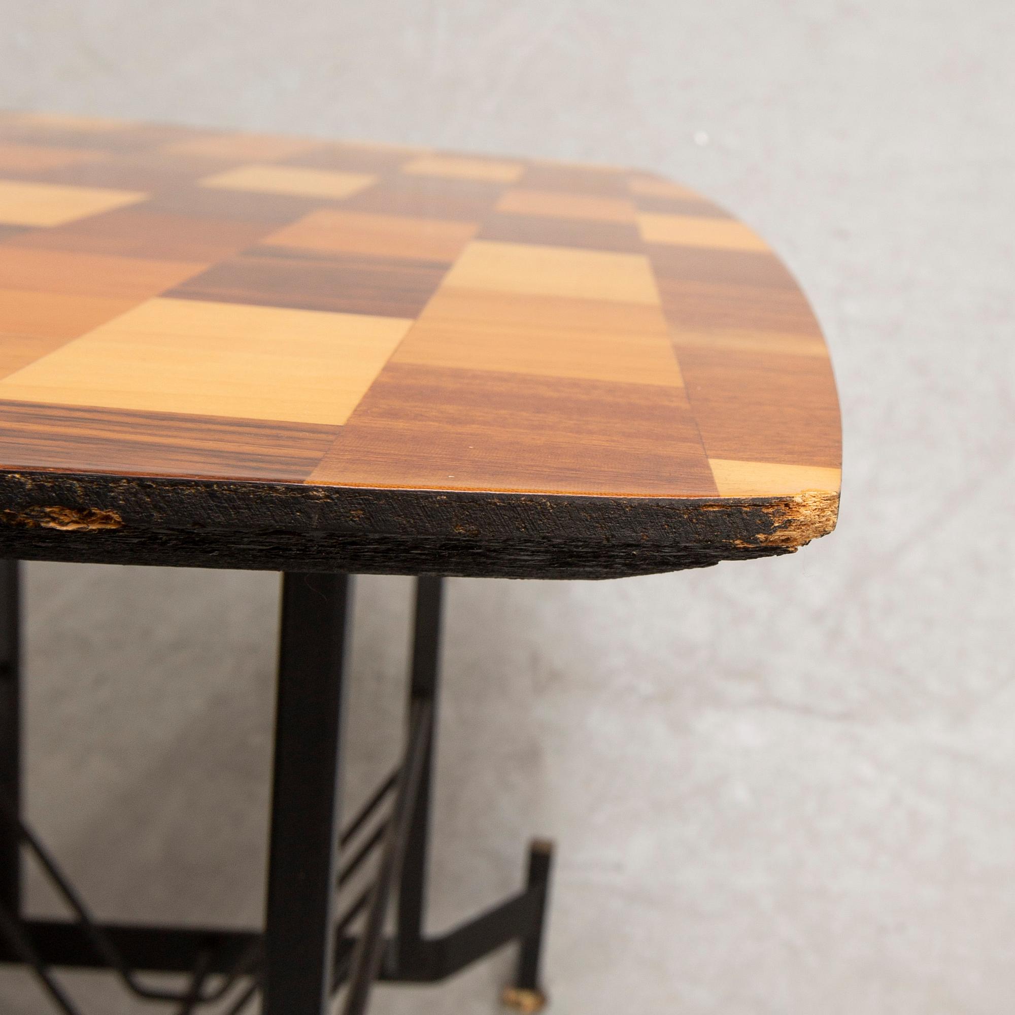 An Italian 1950s mahogany, walnut side table.