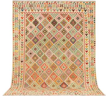 A Kilim carpet, c. 390 x 306 cm.