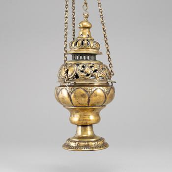 An 18th century brass censer.