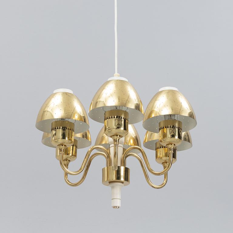 Hans-Agne Jakobsson, a 'T526' brass and wood ceiling light from Markaryd.