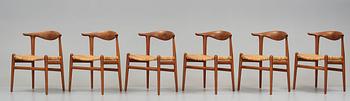 Hans J. Wegner, a set of six teak and rattan "Cowhorn Chairs" "JH-505", executed by cabinetmaker Johannes Hansen, Denmark 1950-60's.