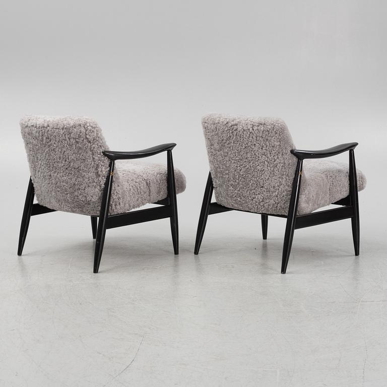 A pair of easy chairs, 1950's/60's.
