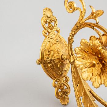 A pair of wall sconces from the late 19th century.