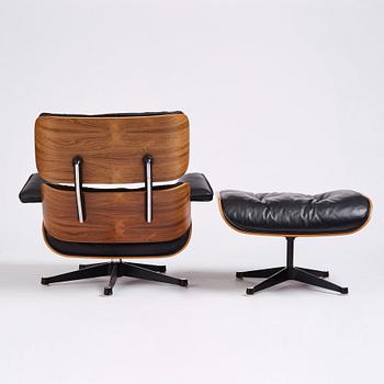 Charles & Ray Eames, a 'Lounge chair' and ottoman, Vitra, 1960-1970s.