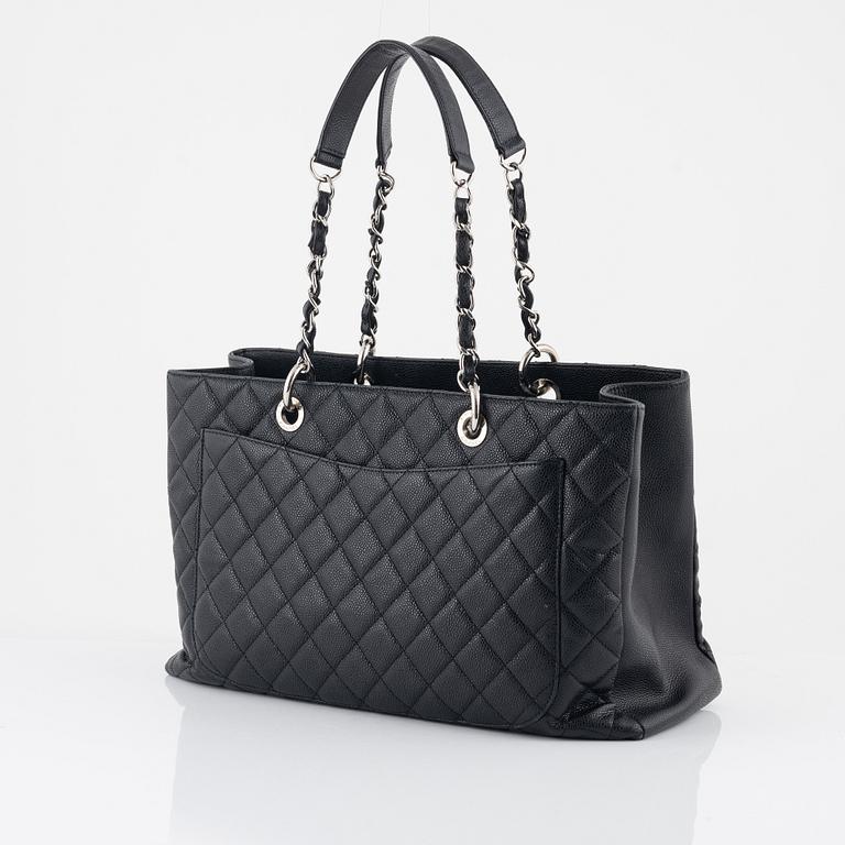 Chanel, A black caviar leather "Shopping Tote" bag, 2013-2014.