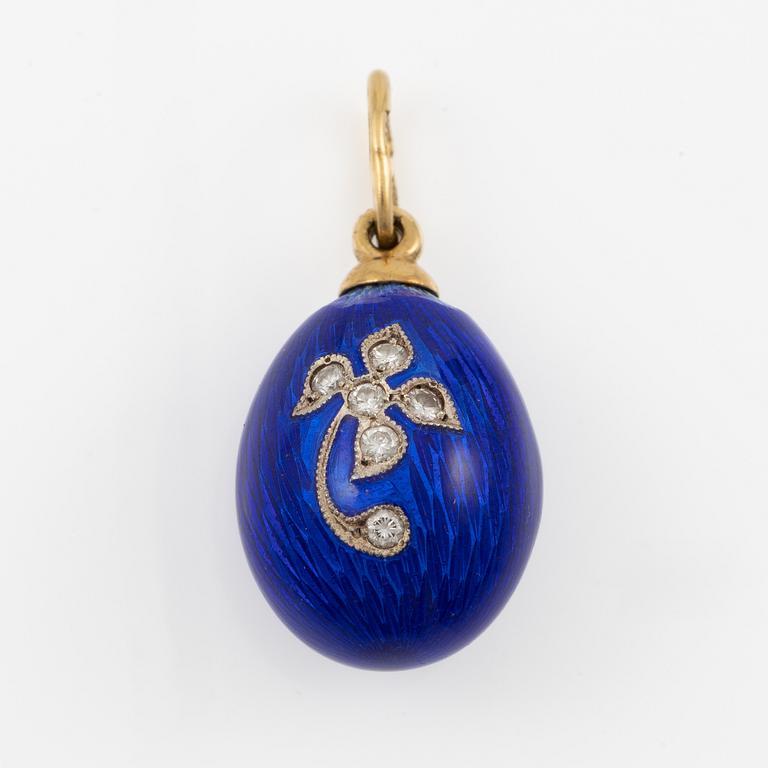 A W.A. Bolin pendant in the form of an egg, 18K gold and silver with enamel, set with round brilliant-cut diamonds.