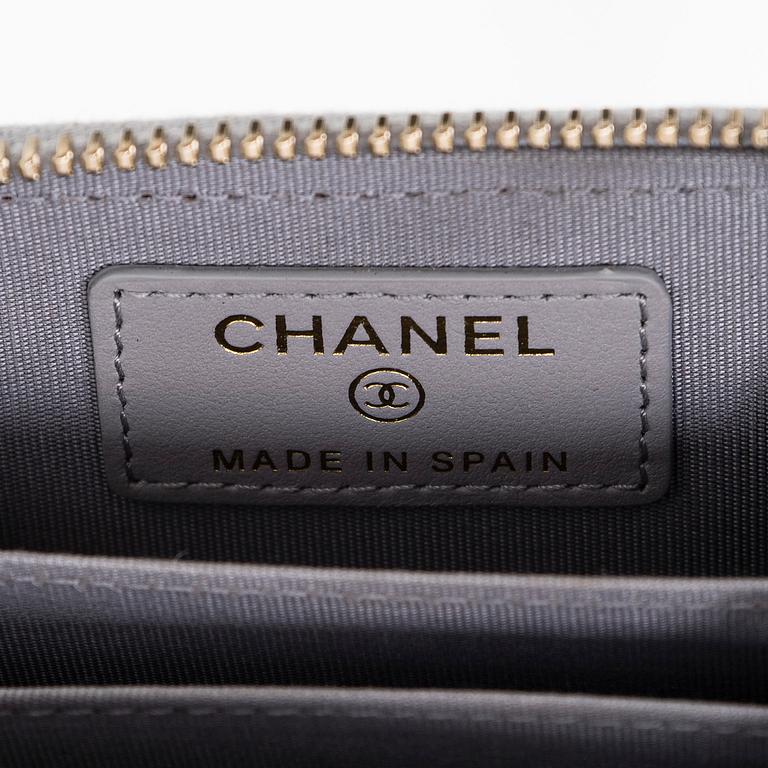 Chanel, A "19 O-coin purse" wallet.