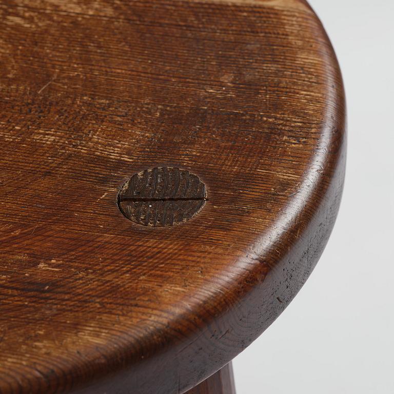 Axel Einar Hjorth, a stained pine "Skoga" stool, Nordiska Kompaniet, Sweden, 1930s.