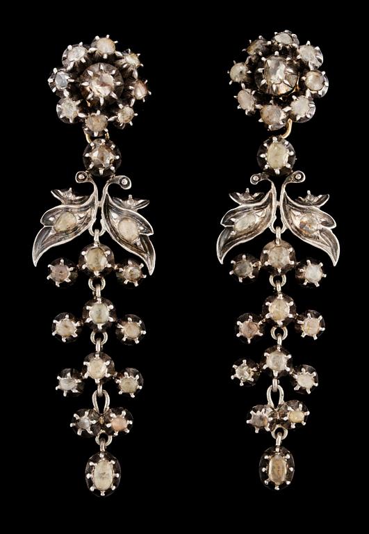 A pair of 19th cent, silver and diamond earrings.