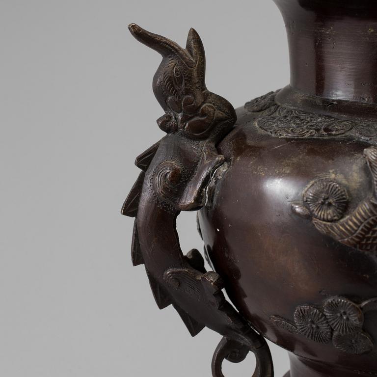A Japanese bronze vase and cover, Meiji, late 19th century.