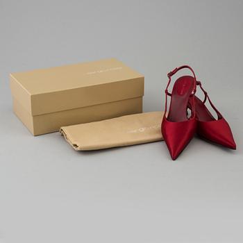 Red silk slingbacks by Sergio Rossi.