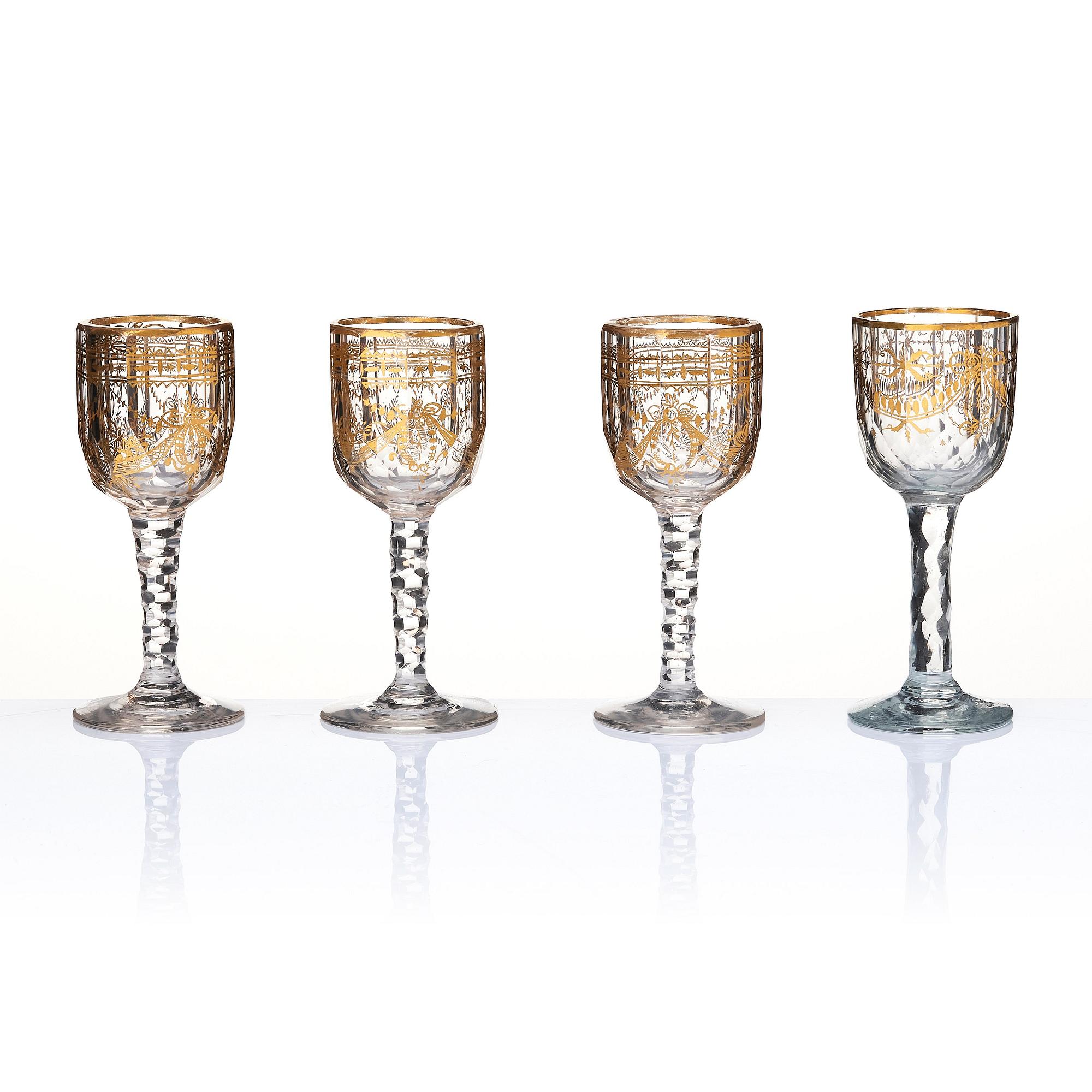 A set of seven cut and gilded glasses, 18th Century.