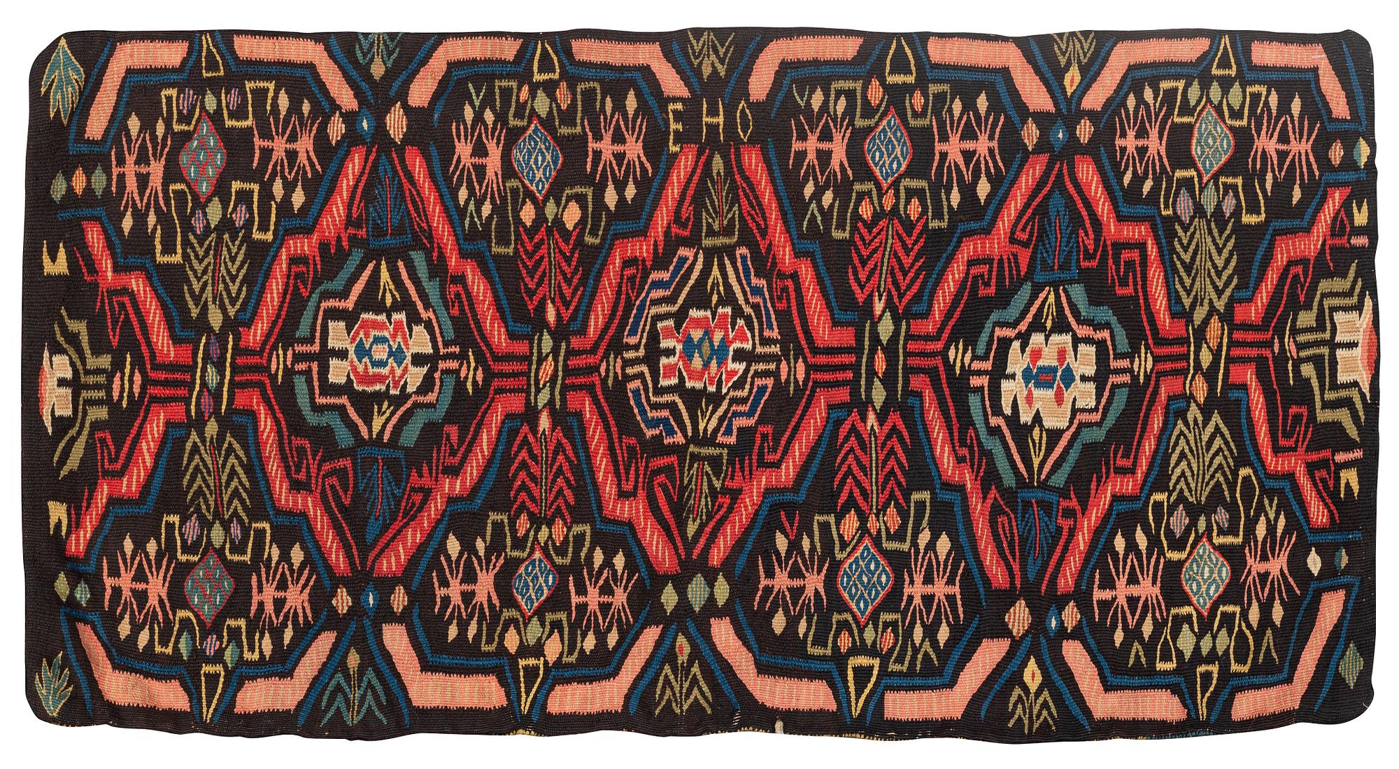 A carrige cushion, "Rosor i krans", tapestry weave, ca 95 x 48 cm, Scania, 1775-1800.