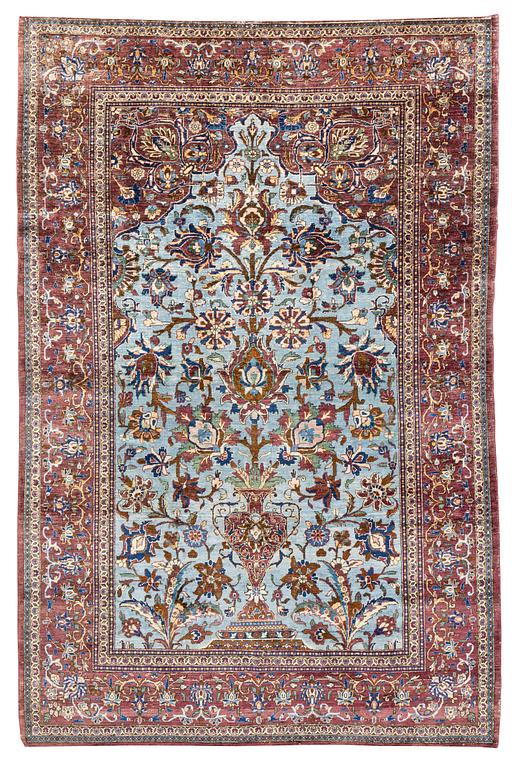 An antique silk Kashan, rug, ca 198,5 x 129,5 cm.