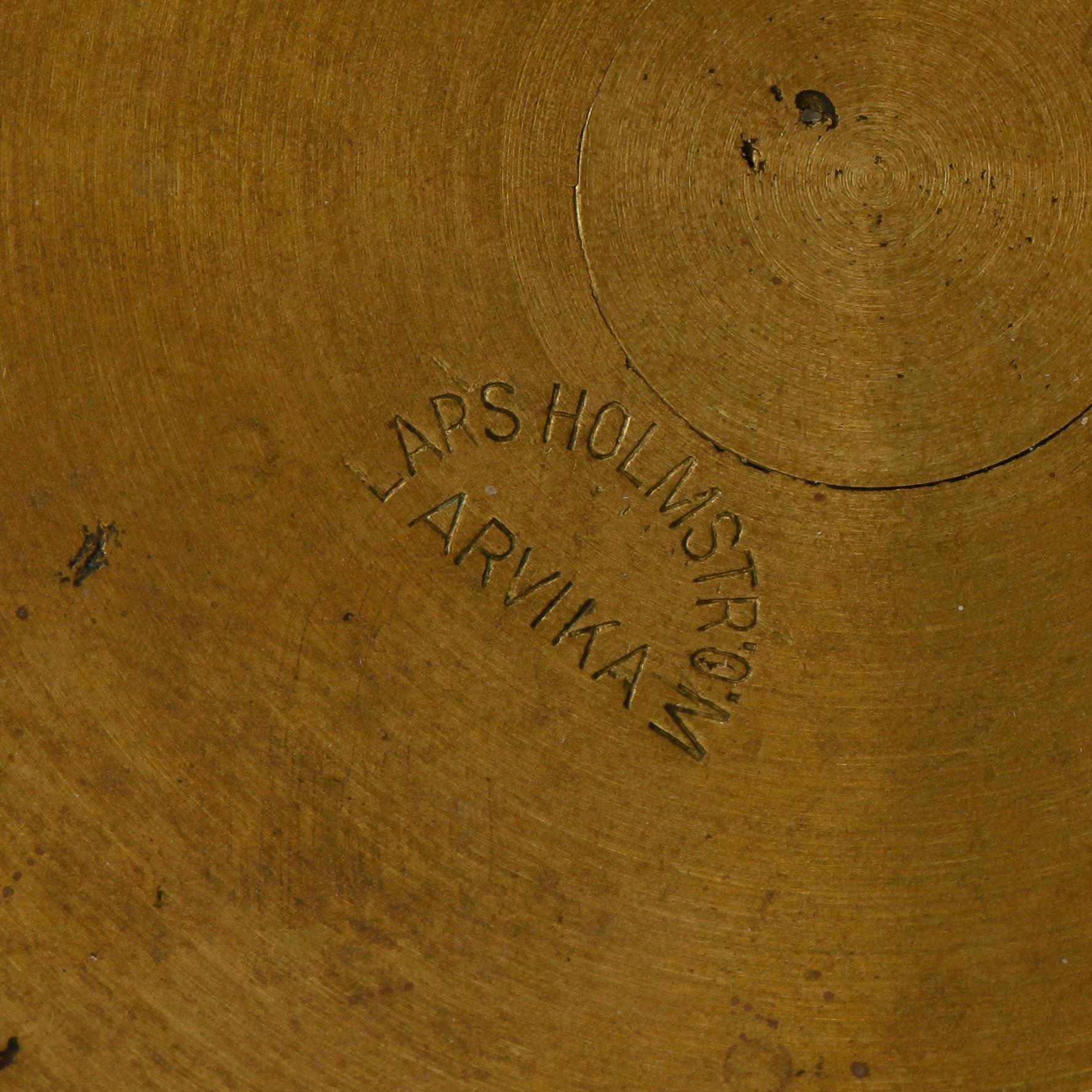 LJUSSTAKE, mässing, Lars Holmström, Arvika.