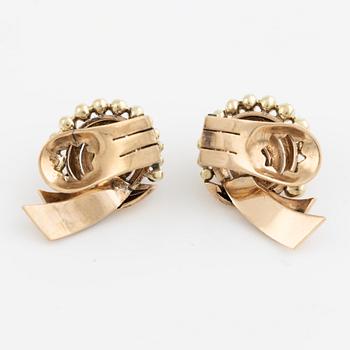 A pair of earrings in 14K gold set with old-cut diamonds.