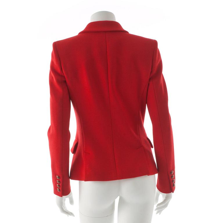 EMILIO PUCCI, a red cottonblend jacket.