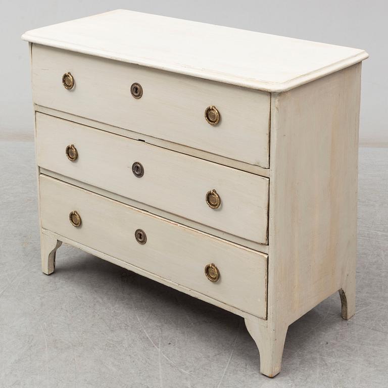 A mid 19th century painted chest of drawers.