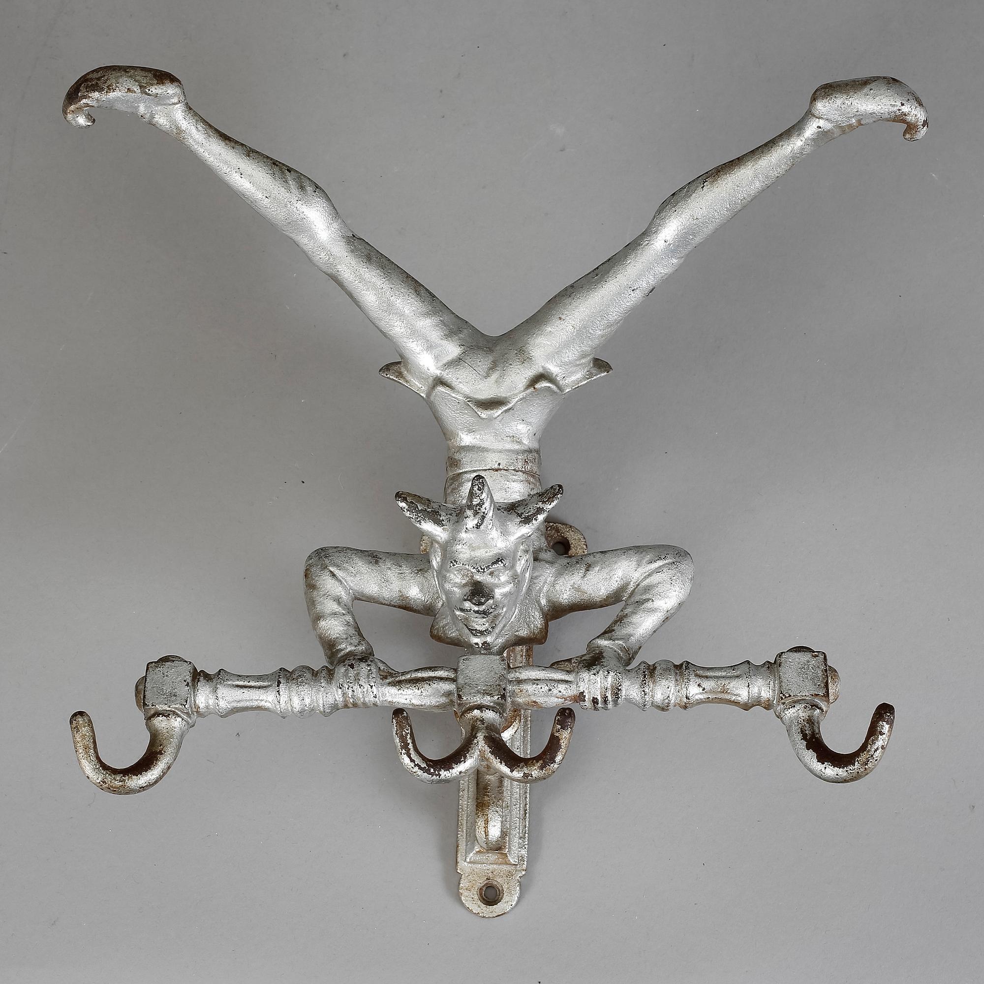 KLÄDHÄNGARE, gjutjärn, 1900-talets första hälft.