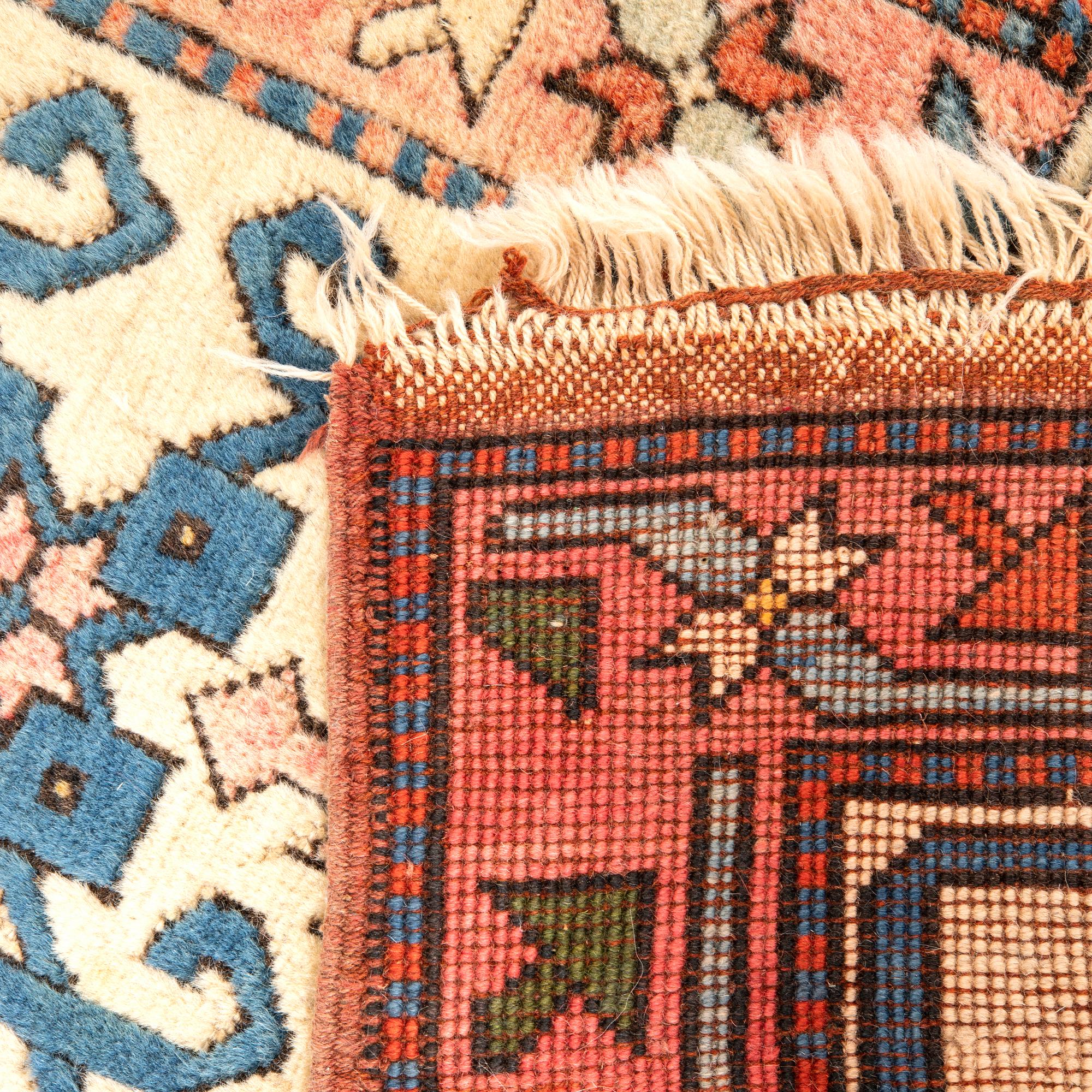 A semaintique Konya carpet ca 330x226 cm.
